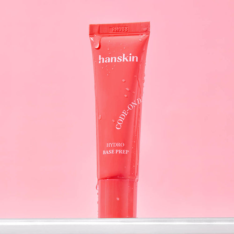 ProtoClinical k-beauty Hanskin CODE-ON DD Hydro Base Prep 30ml single upright rosy pink package centered on a pale pink background.