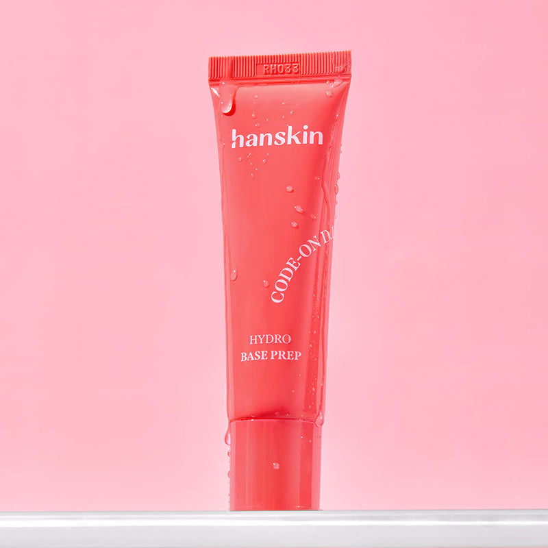 ProtoClinical k-beauty Hanskin CODE-ON DD Hydro Base Prep 30ml single upright rosy pink package centered on a pale pink background.