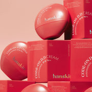 ProtoClinical k-beauty rose and red skincare bottle silhouette with a darker base on a pale pink background.