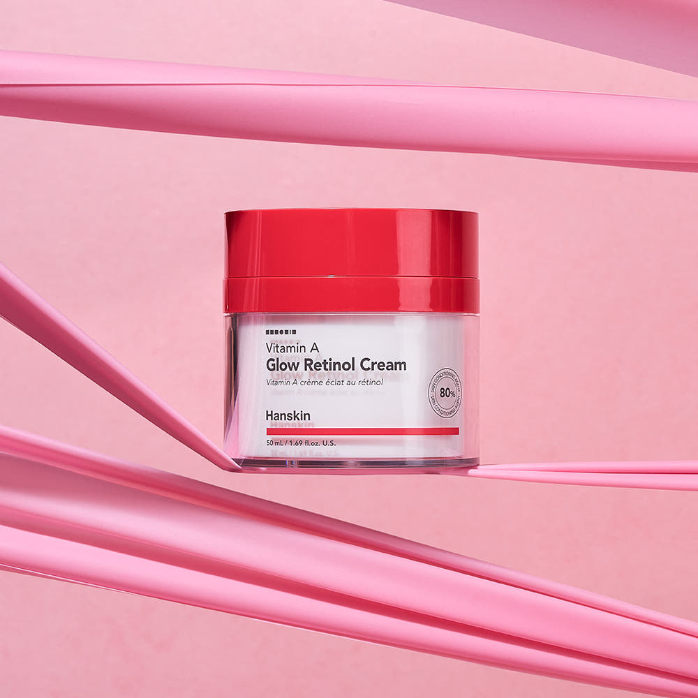 ProtoClinical k-beauty Hanskin Vitamin A Glow Retinol Cream 50ml in a single pink cream jar with a dark lid, centered on a white background with pale blue corner accents