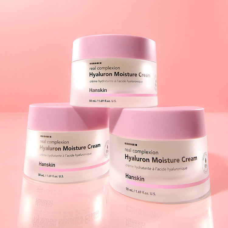 ProtoClinical k-beauty Hanskin Real Complexion Hyaluron Moisture Cream 50ml with a light-toned cream jar and matching box on a soft pink background