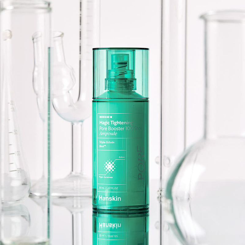 ProtoClinical k-beauty tall teal beauty product centered on a soft pink background.