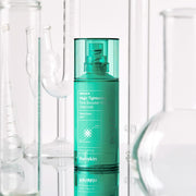ProtoClinical k-beauty tall teal beauty product centered on a soft pink background.