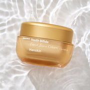 ProtoClinical k-beauty Hanskin Youth Bifida Expert Biome Cream 50ml in a single gold cream jar with a matching lid, centered on a pale blue and white background