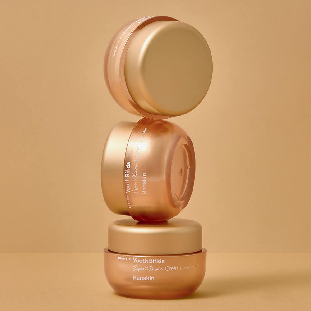 ProtoClinical k-beauty Hanskin Youth Bifida Expert Biome Cream 50ml single gold cream jar with a matching lid centered on a light background