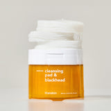 ProtoClinical k-beauty Hanskin Cleansing Pad & Blackhead 200ml/70ea amber cleansing pad jar with a white lid topped by stacked white pads on a pale background