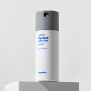 ProtoClinical k-beauty Hanskin Perfect All In One Lotion 115ml in a single tall gray lotion bottle, centered upright on a pale gray and white background