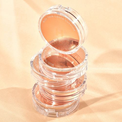 ProtoClinical k-beauty tall peach skincare bottle silhouette on a pale peach background.