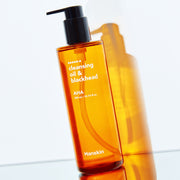 ProtoClinical k-beauty single upright orange package with a tall narrow silhouette centered on a pale blue and cream background.