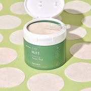 ProtoClinical k-beauty soft green beauty graphic with pale cream edges on a light background.