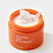 ProtoClinical k-beauty Hanskin Cleansing Balm & Blackhead 80g round orange cleansing balm jar centered on a light blue background.