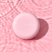 ProtoClinical k-beauty Hanskin Pink Mool Balm SPF30 PA++ 8g single pink balm container centered on a soft pink background with deeper mauve side shading.