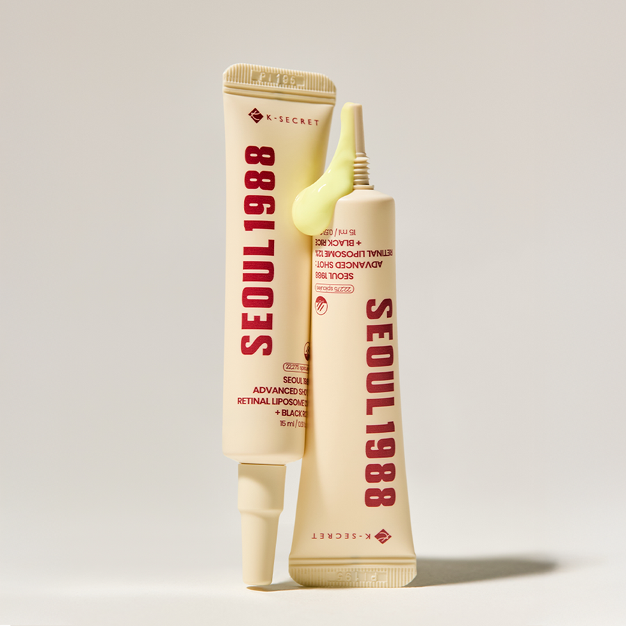 ProtoClinical k-beauty K-SECRET SEOUL 1988 ADVANCED SHOT : RETINAL LIPOSOME 12% + BLACK RICE 15ml single beige bottle centered upright on a soft gray background with pale cream side accents