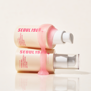 ProtoClinical k-beauty K-SECRET SEOUL 1988 BOOSTING SERUM : COLLAGEN COMPLEX 7 + RED GINSENG 30ml in a single amber pump bottle, centered upright on a light cream background
