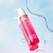 ProtoClinical k-beauty isoi Brightening Cleansing Oil 150ml in a pale blue and lavender bottle silhouette with a muted mauve vertical center on a light background