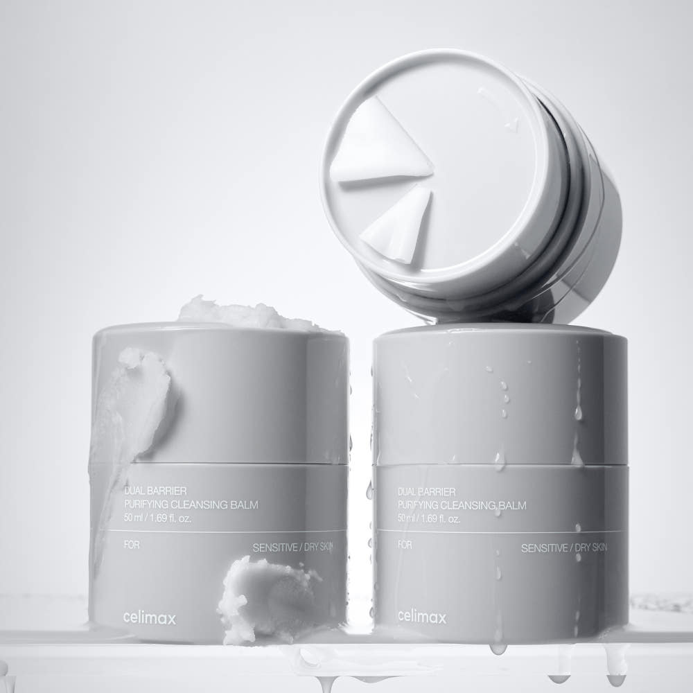 ProtoClinical k-beauty two slim gray skincare bottles on a light background.