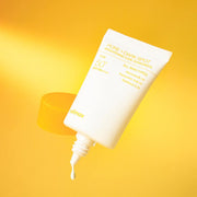 ProtoClinical k-beauty celimax Pore+ Dark Spot Brightening Care Sunscreen SPF50+ PA++++ 50ml single yellow sunscreen tube centered on a pale yellow background.