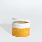 ProtoClinical k-beauty celimax Pore+ Dark Spot Brightening Pad 100ml/40ea in a yellow round jar with a white lid flipped open on a light gray background