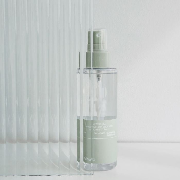 ProtoClinical k-beauty celimax JI WOO GAE Heartleaf BHA Body Mist 150ml single upright body mist bottle centered on a soft white background