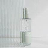 ProtoClinical k-beauty celimax JI WOO GAE Heartleaf BHA Body Mist 150ml single upright body mist bottle centered on a soft white background