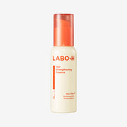 ProtoClinical k-beauty LABO-H Hair Strengthening Essence 75ml as a single upright light beige essence bottle centered on a clean white background with soft blue side accents
