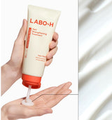 ProtoClinical k-beauty LABO-H Hair Strengthening Treatment 300ml shown as a cream treatment tube dispensing white product into an open hand on a light background