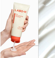 ProtoClinical k-beauty LABO-H Hair Strengthening Treatment 200ml as a single upright light beige treatment bottle centered on a pale background with soft blue side shading