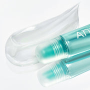 ProtoClinical k-beauty Anua PDRN Lip Serum 10ml single upright turquoise lip serum tube centered on a pale background