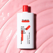 ProtoClinical k-beauty TIAM Anti-Blemish Body Lotion 200ml shown as a single centered upright body lotion package with pale green and cream tones on a light background.