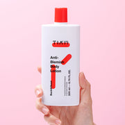 ProtoClinical k-beauty TIAM Anti-Blemish Body Lotion 200ml shown as a single centered upright body lotion package with pale green and beige tones on a light background.
