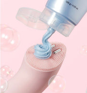 ProtoClinical k-beauty beauty product detail in blush pink and cool gray tones on a light background.