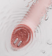 ProtoClinical k-beauty rose-toned beauty product detail with soft aqua side accents on a light background.