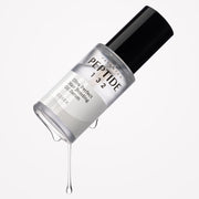 ProtoClinical k-beauty COSRX PEPTIDE-132 Ultra Perfect Hair Bonding Oil Serum 28ml tilted silver bottle with a black cap and clear serum dripping on a white background