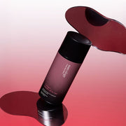 ProtoClinical k-beauty warm coral beauty product detail on a light background.