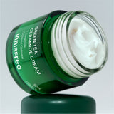 ProtoClinical k-beauty innisfree Green Tea Ceramide Cream 50ml single dark green cream jar with a matching lid centered on a light background