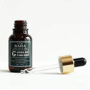 ProtoClinical k-beauty Cos De BAHA G Glycolic Acid 10% AHA Serum 30ml dark serum bottle with matching box side by side on a white background