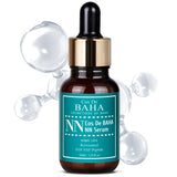 ProtoClinical k-beauty Cos De BAHA Nicotinamide Mononucleotide NMN 10% NN Serum 30ml brown dropper serum bottle with a teal label in front of clear spheres on a white background