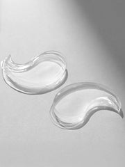 ProtoClinical k-beauty bewants Phyto Collagen Eye Serum Patch 80g/60ea two translucent crescent-shaped eye patches laid flat side by side on a light gray background