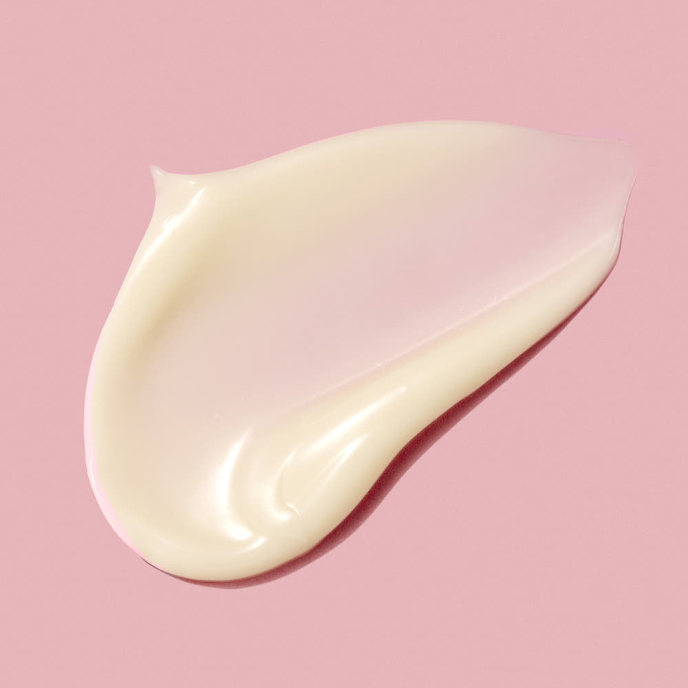ProtoClinical k-beauty CKD Retino Collagen Small Molecule 300 Guasha Neck Cream 50ml glossy beige cream swatch shown close up on a soft pink background