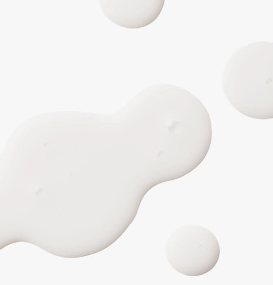 ProtoClinical k-beauty UIQ Biome Barrie Cream Mist 100ml frosted mist bottle held in one hand with the spray nozzle exposed against a beige background