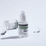 ProtoClinical k-beauty DERMA FACTORY Niacinamide 20% Serum 30ml shown as a single upright serum bottle centered on a pale gray background