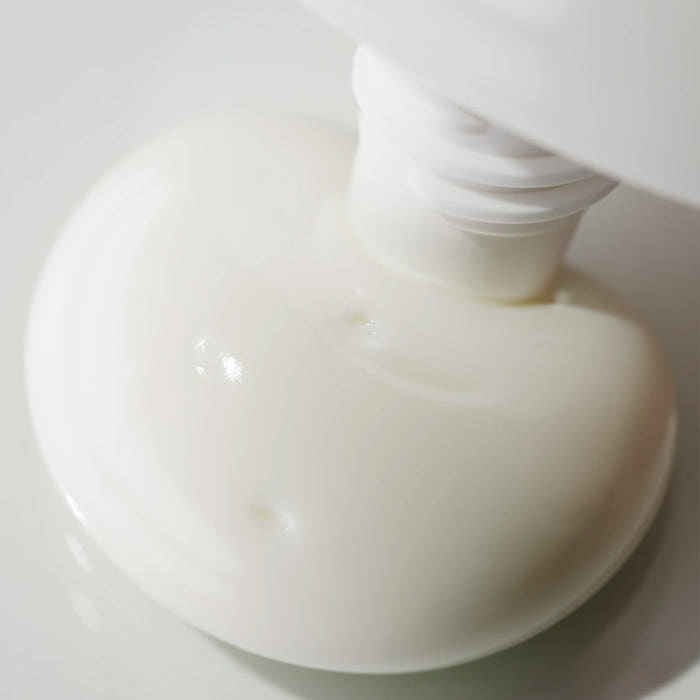ProtoClinical k-beauty SCINIC Enjoy Super Mild Sun Essence SPF50+ PA++++ 50ml single upright pale blue sun essence container with a rounded teal cap on a clean light background