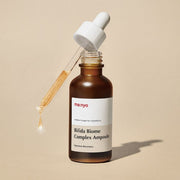 ProtoClinical k-beauty [MANYO FACTORY] Bifida Biome Complex Ampoule 50ml beige beauty product silhouette with a soft taupe center on a light background