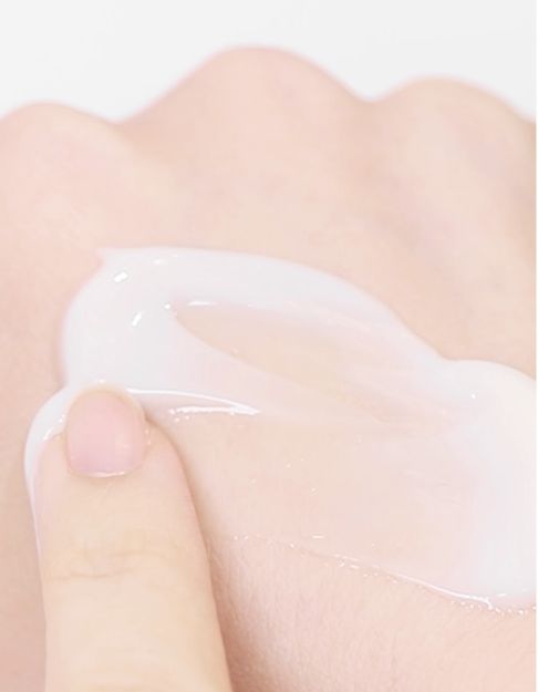 ProtoClinical k-beauty soft peach beauty graphic with a muted blue accent on a pale background.