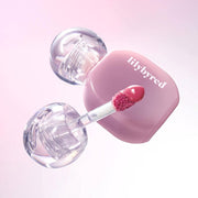 ProtoClinical k-beauty lilybyred Balming Dewy Tint 6g (6colors) single rounded lip tint bottle shown upright with a glossy pink cap on a soft pink background