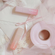 ProtoClinical k-beauty lilybyred Sweet Liar Milky Tint 4g (14colors) single lip tint packaging in a square close-up product shot on a light background