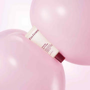 ProtoClinical k-beauty mauve and plum beauty graphic with soft blurred shading on a light background.