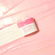 ProtoClinical k-beauty soft rose beauty product silhouette on a pale background.
