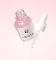 ProtoClinical k-beauty [Beauty of Joseon] Pore Firming Serum (Red Bean PDRN+Peptide) 30ml open pink serum bottle with a detached white dropper and glossy serum drips on a pale pink background