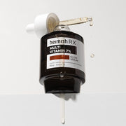 ProtoClinical k-beauty heimish RX Multi Vitamin Glow Serum 35ml single upright dark serum bottle centered on a light background with soft beige side shading.